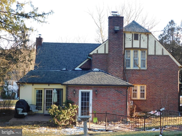 rear view of property with a patio area