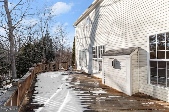 view of snow covered deck