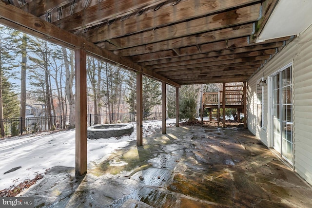 view of snow covered patio