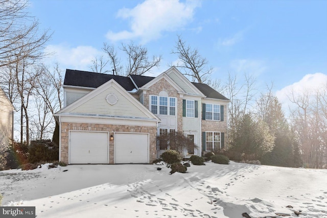 view of front property with a garage