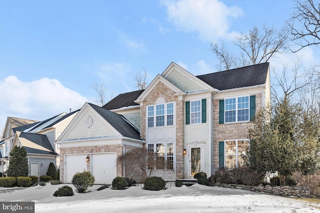 view of front of house with a garage