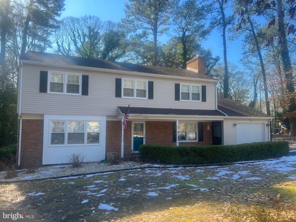 view of front of home with a garage