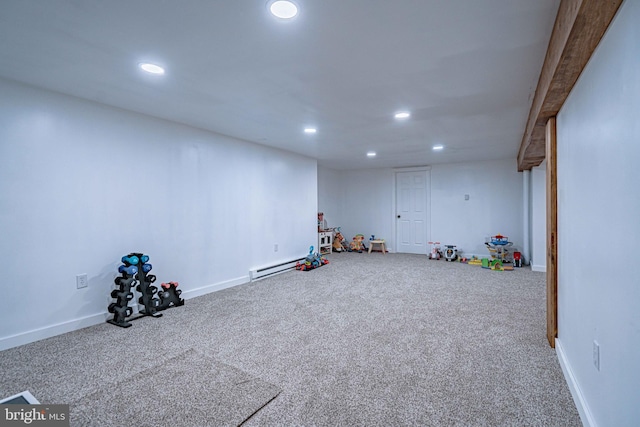 playroom featuring baseboard heating and carpet flooring