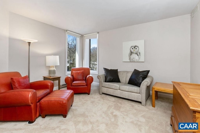 living room with light colored carpet