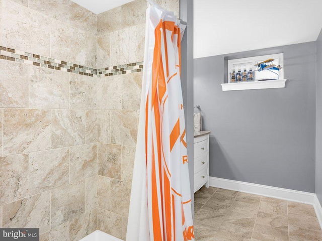 bathroom with curtained shower