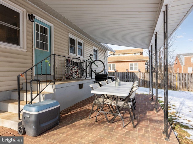 view of snow covered patio