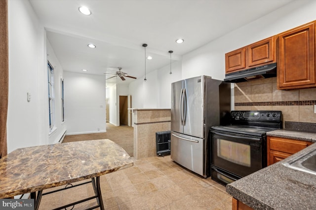 kitchen with stainless steel refrigerator, decorative light fixtures, decorative backsplash, electric range, and ceiling fan