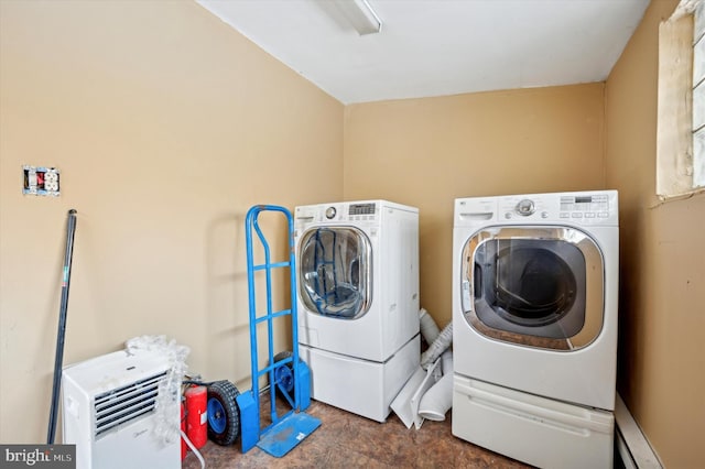 laundry area with washing machine and dryer