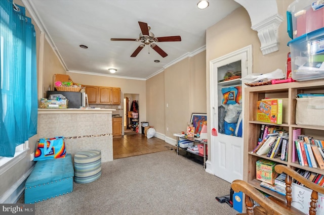 rec room featuring ceiling fan and light carpet