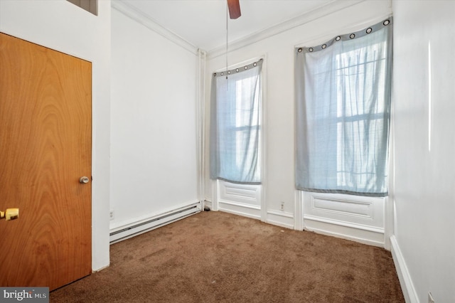 carpeted spare room featuring a baseboard radiator, ornamental molding, and ceiling fan