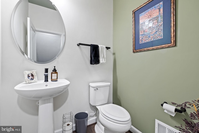 bathroom featuring toilet