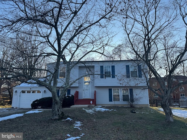 view of front of property featuring a garage