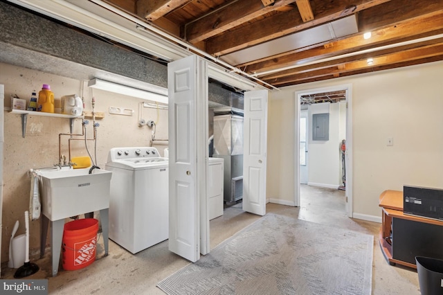 basement with washer / clothes dryer and electric panel