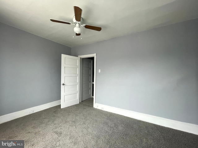 interior space with ceiling fan