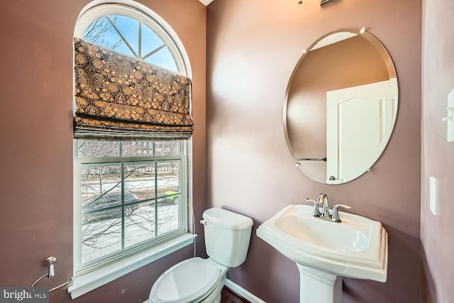 bathroom with toilet and sink