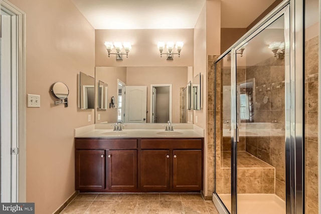 bathroom with vanity and an enclosed shower