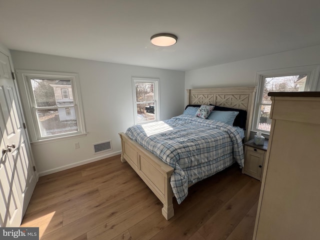 bedroom with light hardwood / wood-style flooring