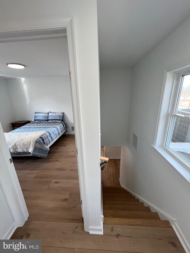 bedroom featuring hardwood / wood-style flooring