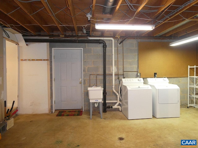 basement with washing machine and dryer