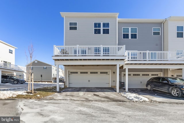 view of front of house with a balcony and a garage