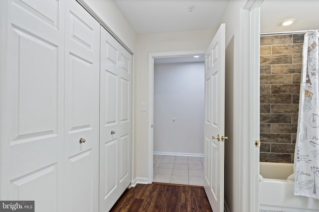 hall featuring dark hardwood / wood-style floors