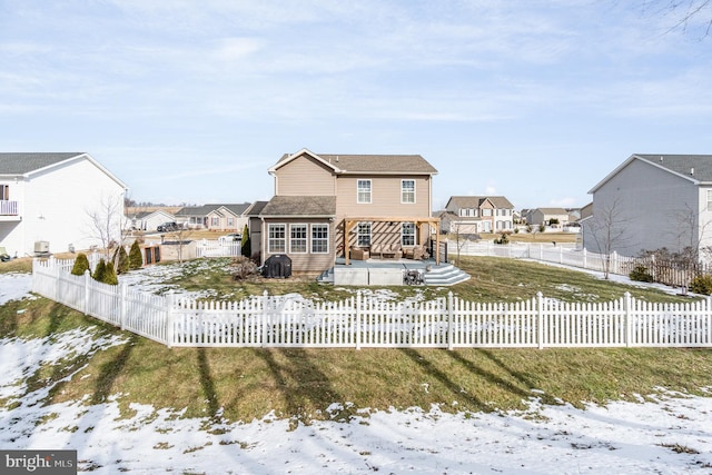 view of snow covered house