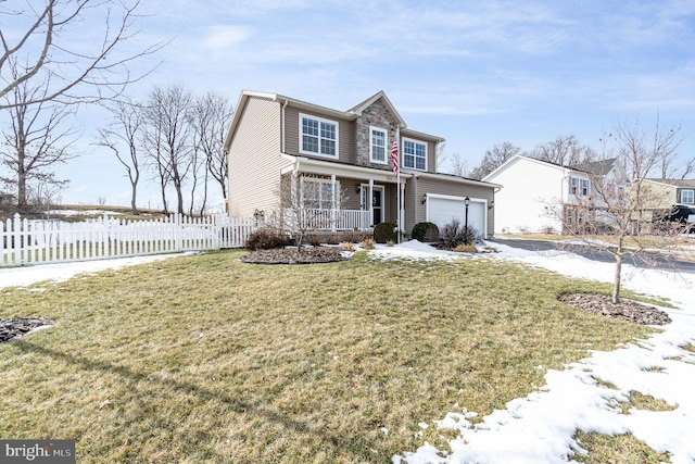 front facade featuring a porch, a garage, and a front lawn