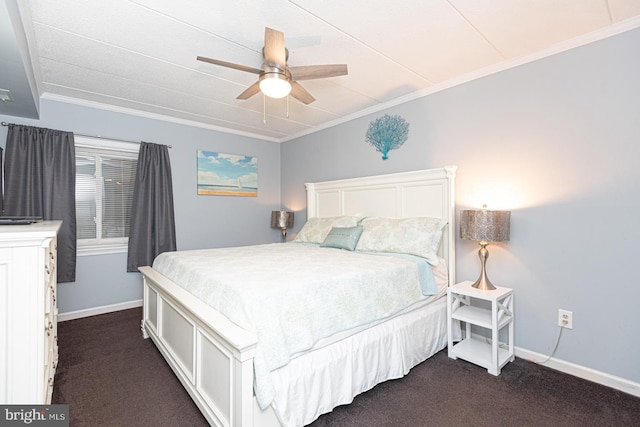 carpeted bedroom featuring ornamental molding and ceiling fan