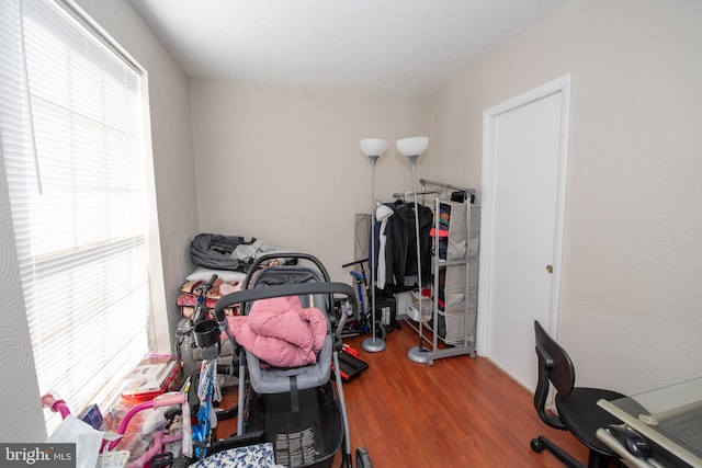 home office with hardwood / wood-style floors