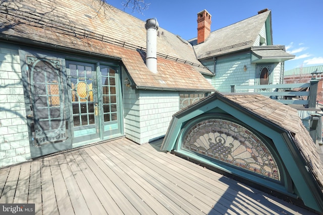 wooden terrace featuring french doors