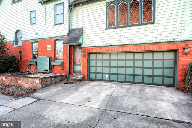 exterior space with a garage