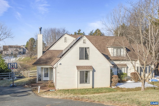 view of front of home with a front lawn