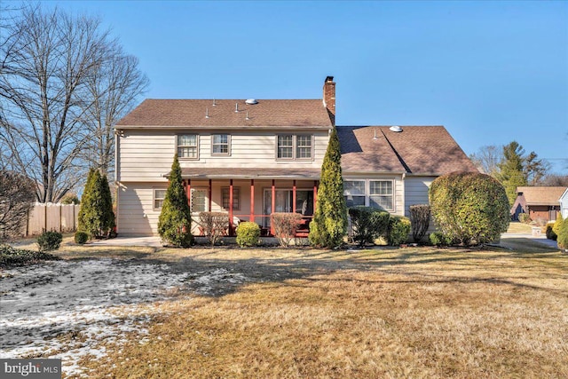 view of front of home featuring a porch and a front yard