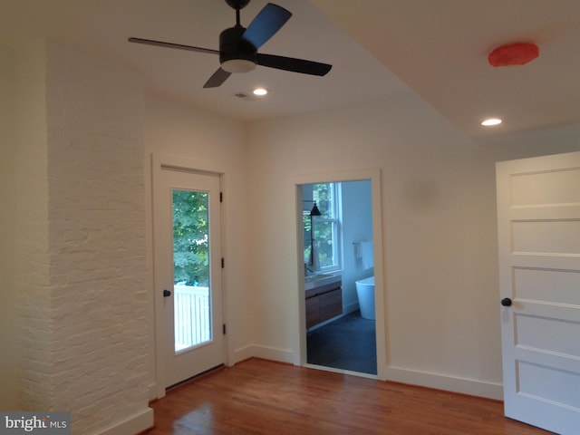 entryway featuring ceiling fan and hardwood / wood-style floors