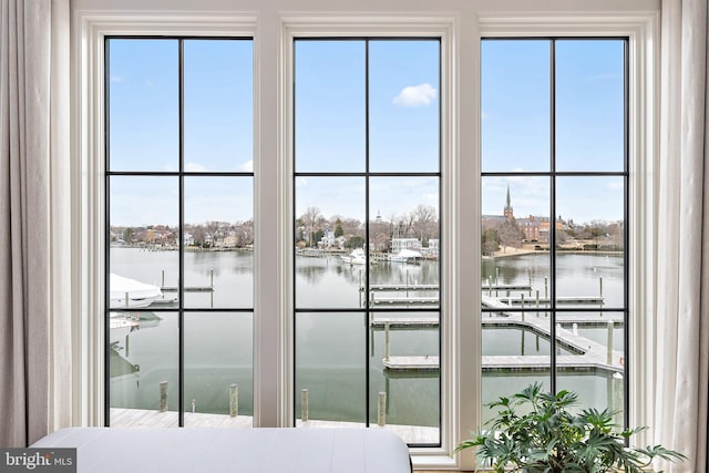 doorway to outside featuring a water view