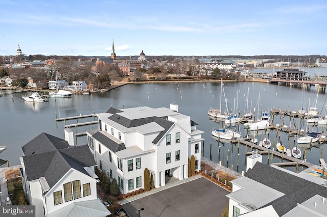 drone / aerial view with a water view