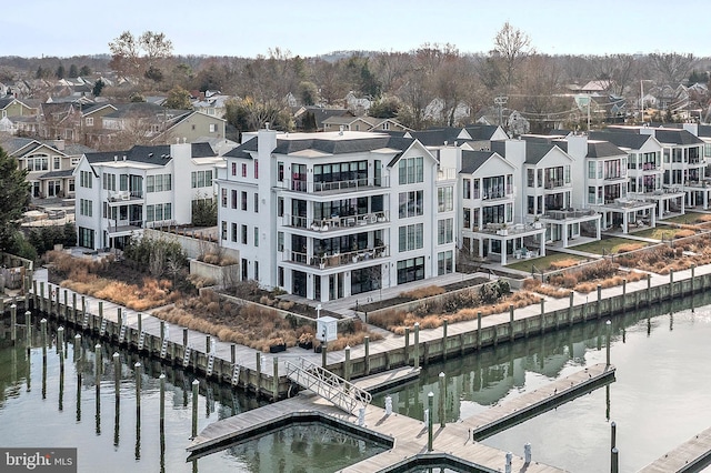 drone / aerial view with a water view