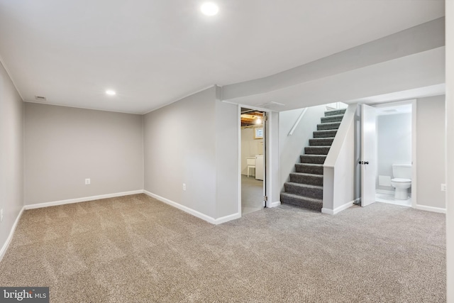 finished basement featuring stairs, carpet floors, recessed lighting, and baseboards