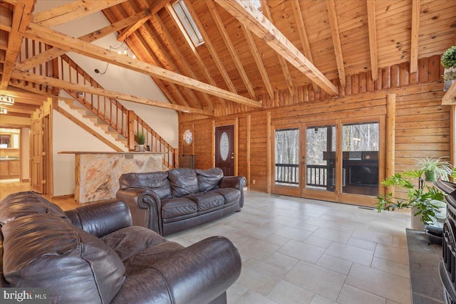 living room with beamed ceiling, high vaulted ceiling, and wood ceiling