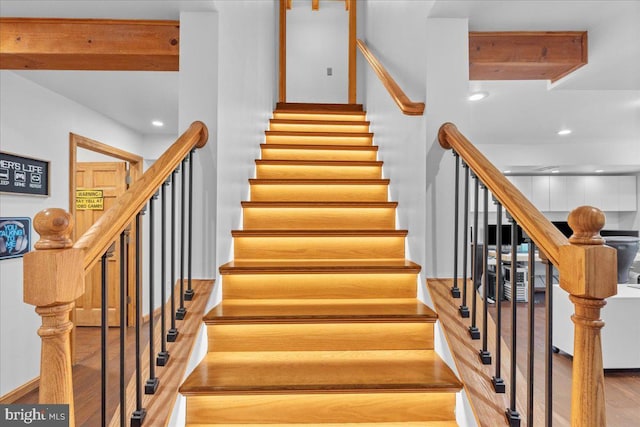 stairway with wood-type flooring