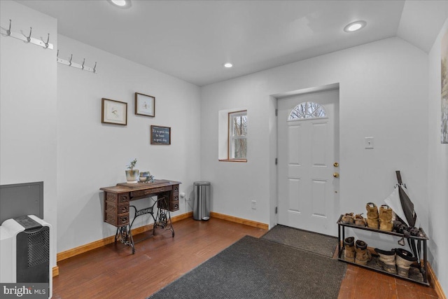 entryway with dark hardwood / wood-style floors