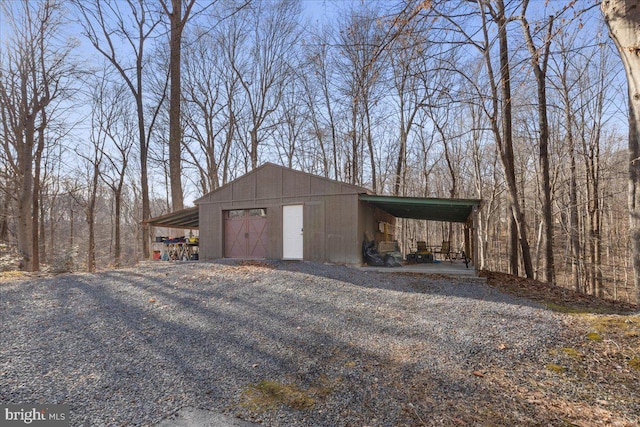 view of outbuilding featuring a garage