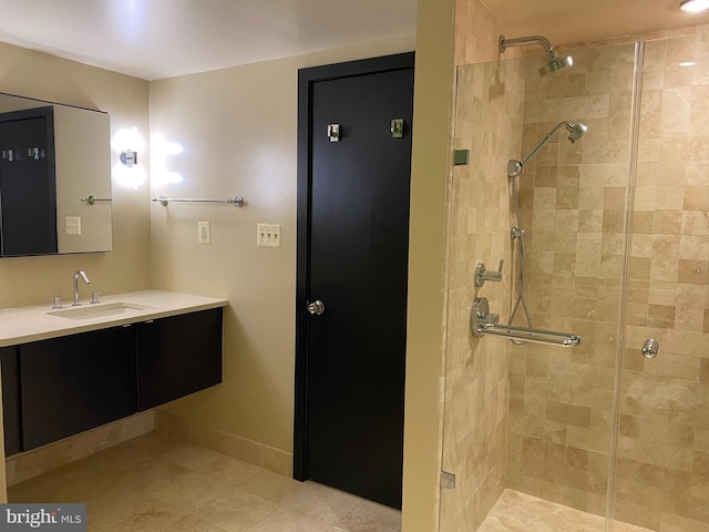 bathroom with an enclosed shower and vanity