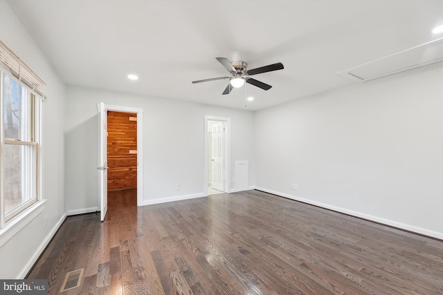 unfurnished room featuring ceiling fan and dark hardwood / wood-style floors