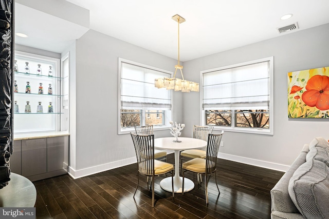 dining room featuring dark hardwood / wood-style floors