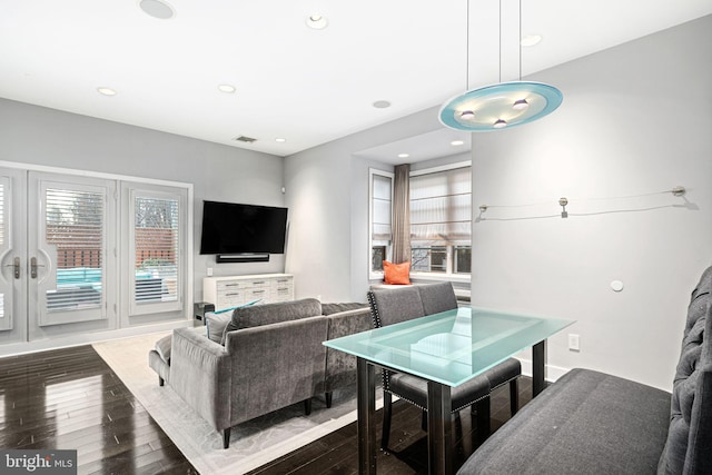 living room with dark hardwood / wood-style floors