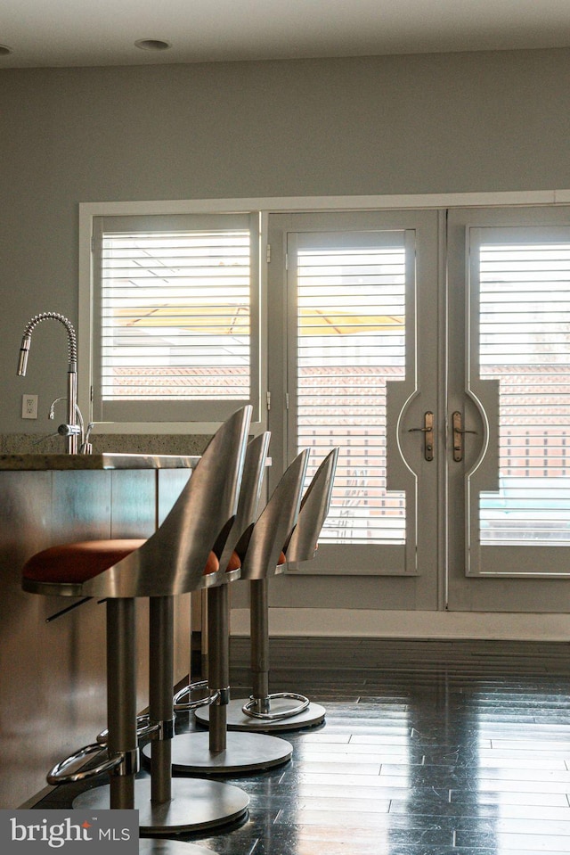 dining area with wood-type flooring