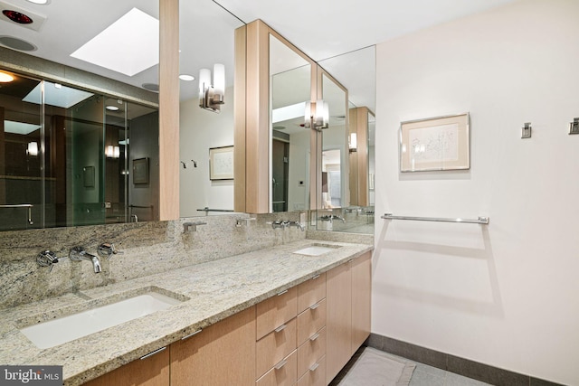 bathroom featuring vanity and tile patterned floors