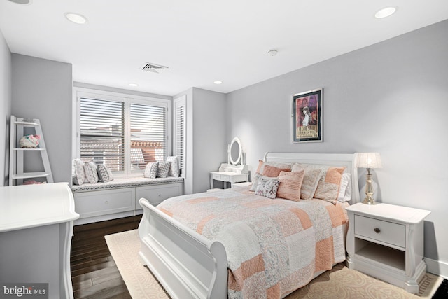 bedroom featuring dark wood-type flooring