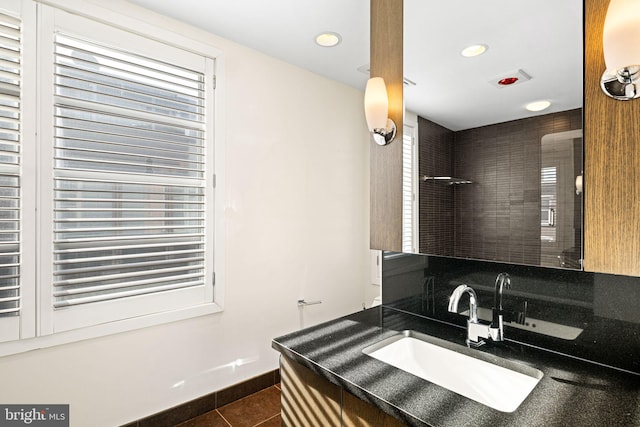 bathroom with vanity and tile patterned floors